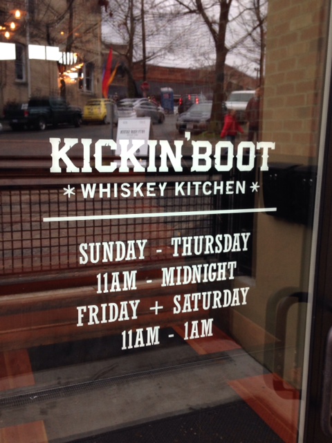 kickin' boot sign